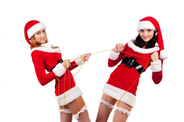 Twee meisje vrienden in kerst kostuums. — Stockfoto