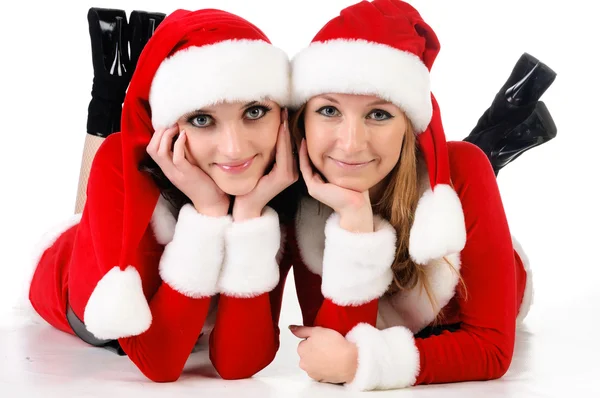 Två väninnor i christmass kostymer. — Stockfoto