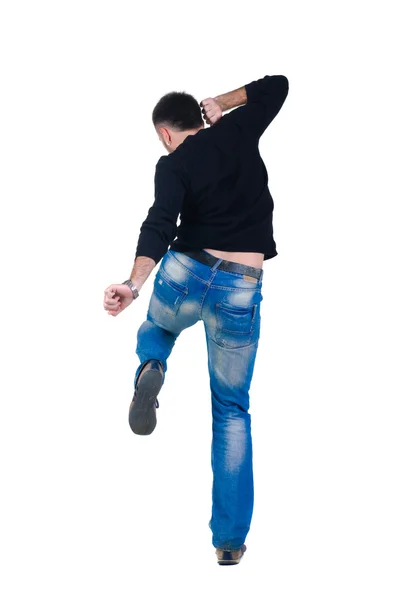 Fiatal férfi tánc. nézet hátulról. — Stock Fotó