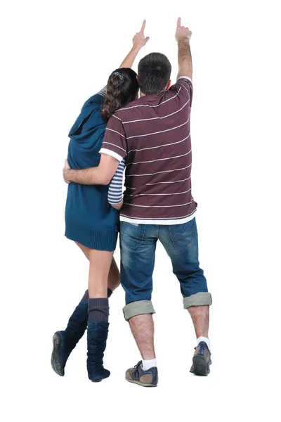 Young couple looks where that. Rear view. — Stock Photo, Image