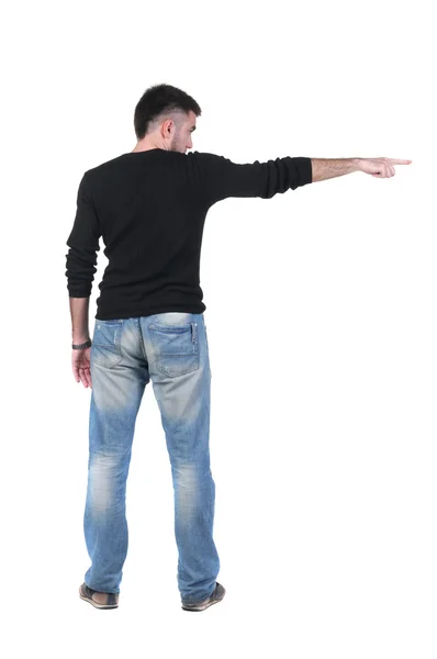 Young Man Pointing Wall Rear View Isolated White — Stock Photo, Image