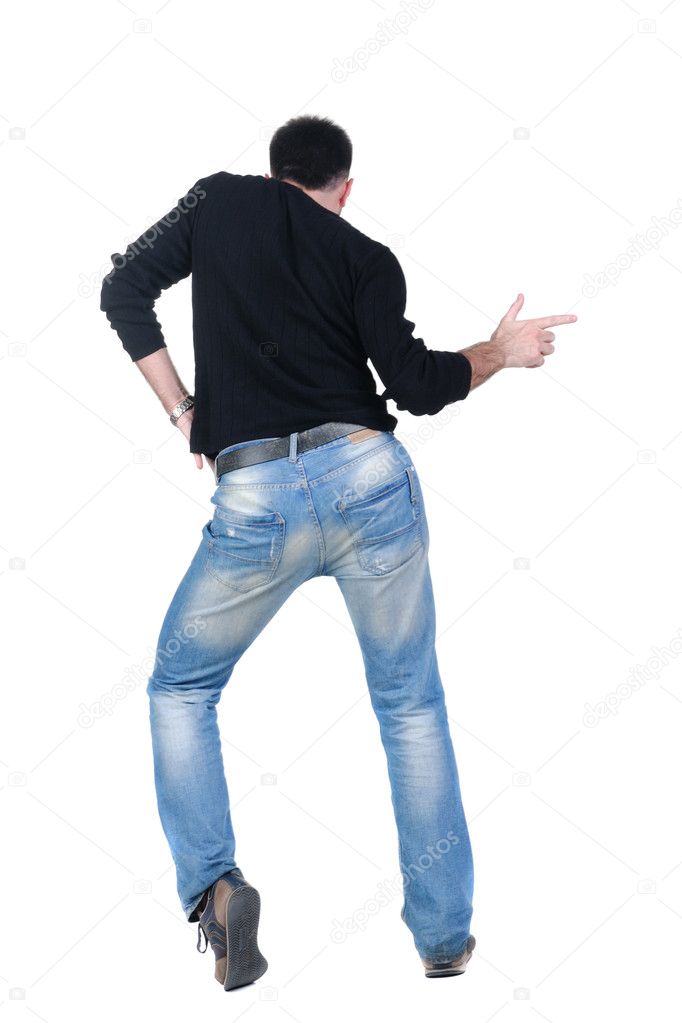 Young man dancing. Rear view. Isolated over white.