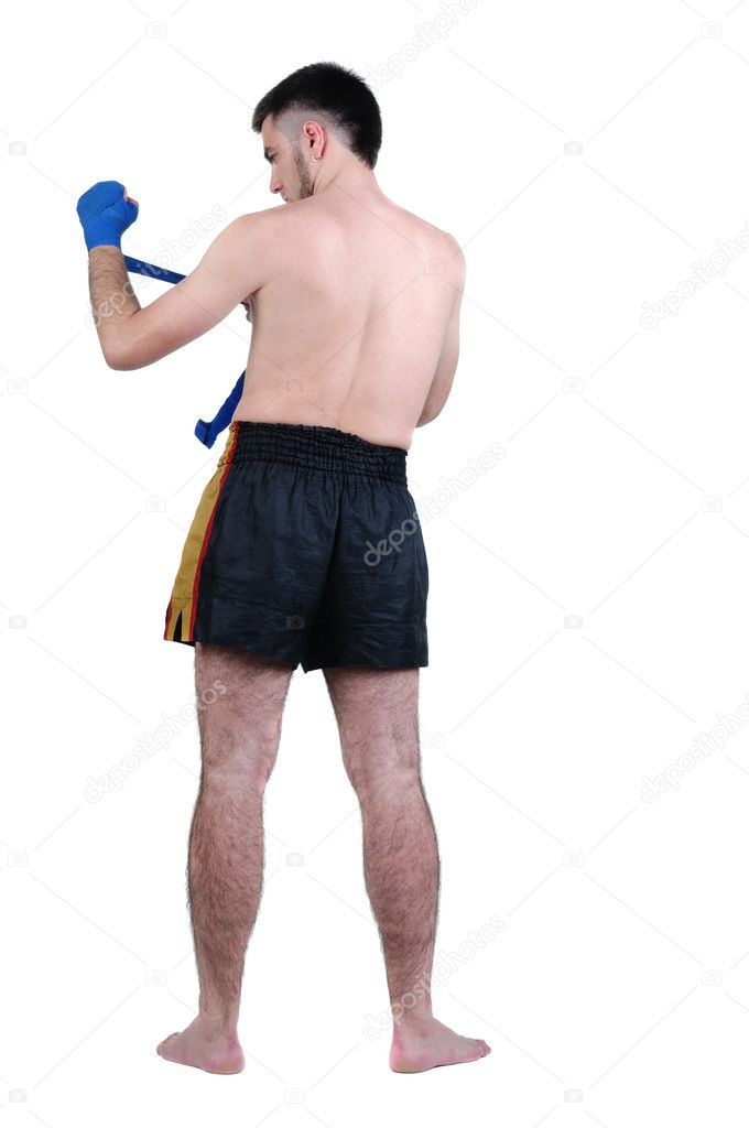 Boxer in shorts . Rear view. Isolated over white.