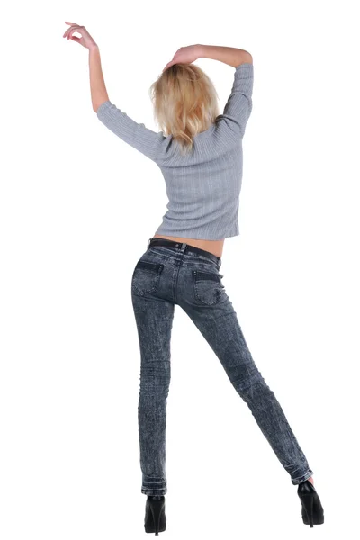 Fiatal nő táncol. nézet hátulról. — Stock Fotó