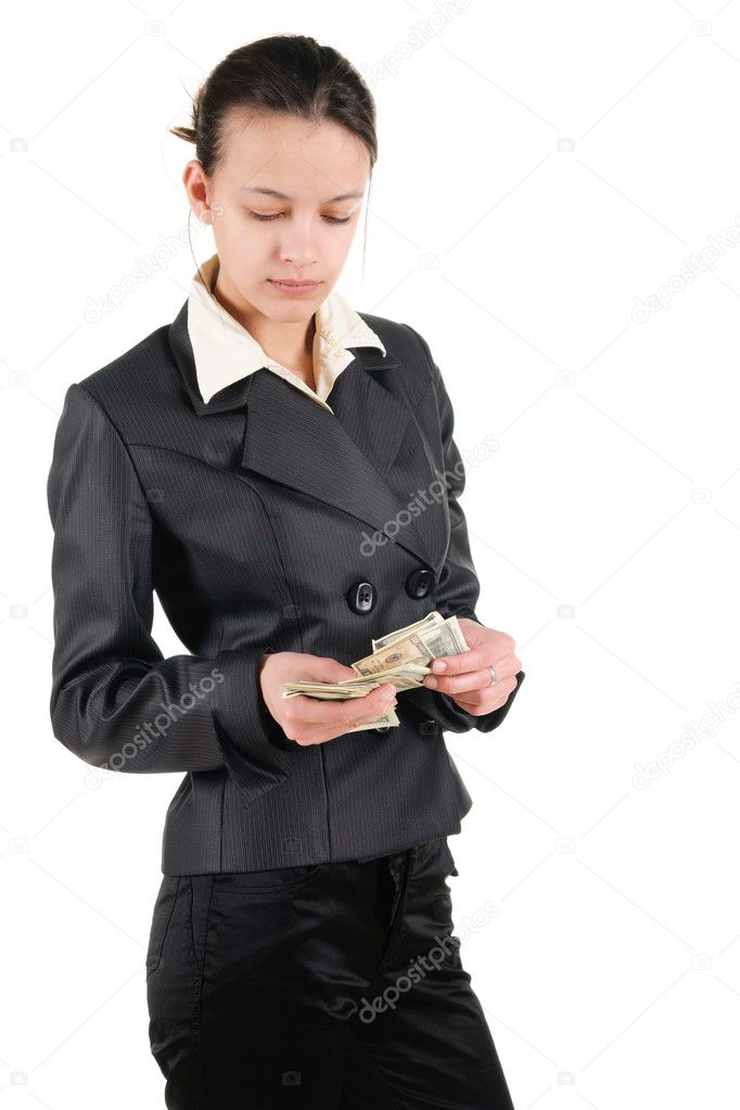 Young businesswoman counts money