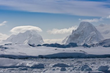 Snow-capped mountains clipart