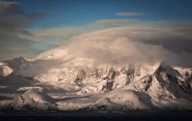 Beautiful snow-capped mountains clipart