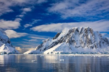 Snow-capped mountains in Antarctica clipart