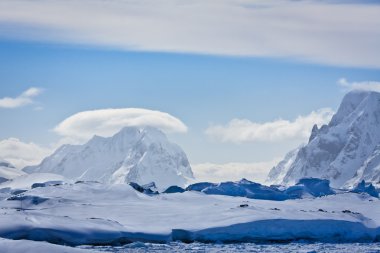 Snow-capped mountains in Antarctica clipart