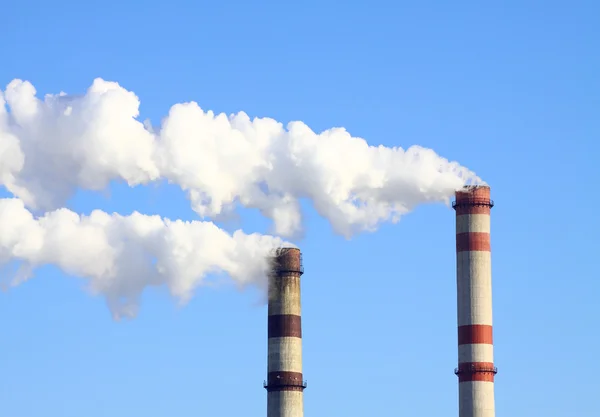 Smoking power station chimneys — Stock Photo, Image