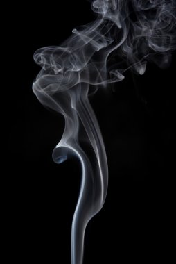 Smoke from a cigarrette detail in black background clipart