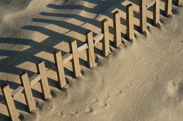 Забор Песке — стоковое фото
