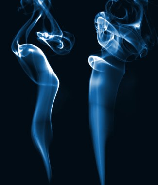 Abstract colored smoke in a white background clipart