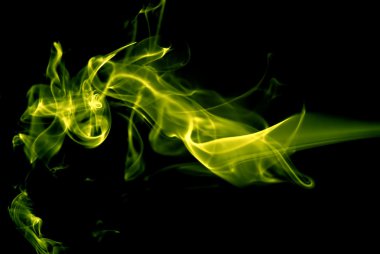 abstract colored smoke in a black background clipart