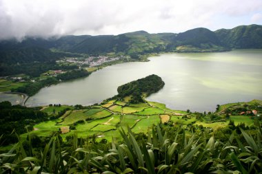 seven lake city in azores island of s miguel clipart