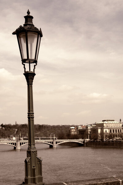 Old picture of river vlatva in prague town, digital work