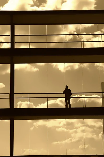 Worker Alone Modern Building Sepia Tone — Stock Photo, Image