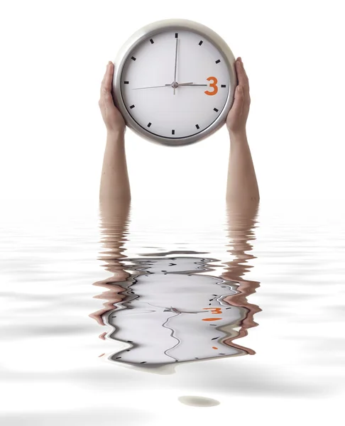 stock image Woman with a clock isolated in white background