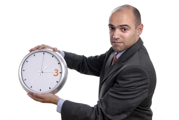 Młody Przystojny Biznesmen Posiadania Zegar — Zdjęcie stockowe