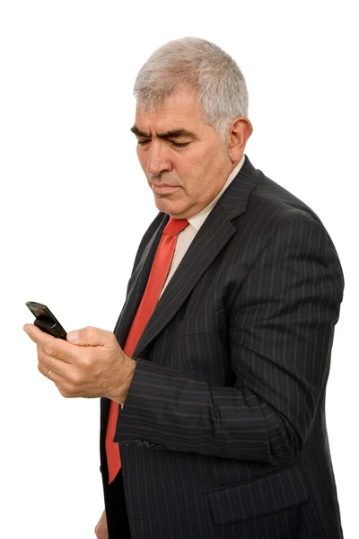 成熟的男人在电话在白色背景上 — 图库照片