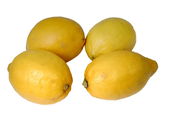 stock image four yellow lemons on a white background