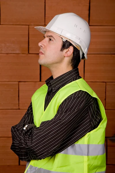 Ingenjör Med Vit Hatt Med Tegelvägg Som Bakgrund — Stockfoto