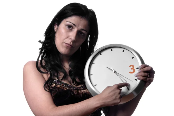 大時計を保持している白人の若い女性 ロイヤリティフリーのストック画像