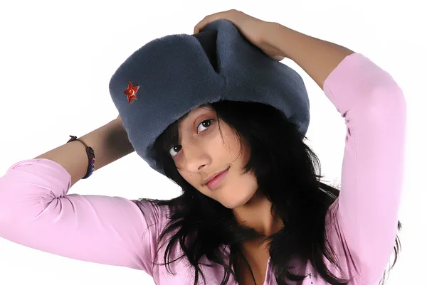 年轻的女孩 与俄罗斯的帽子画像 免版税图库照片