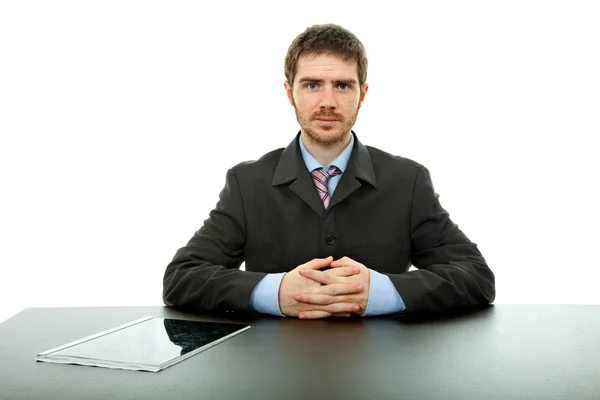 白で隔離され 机の上の若いビジネスマン — ストック写真