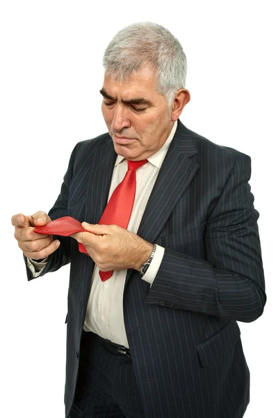 Бізнесмен Регулює Свою Краватку Ізольовано Білому — стокове фото