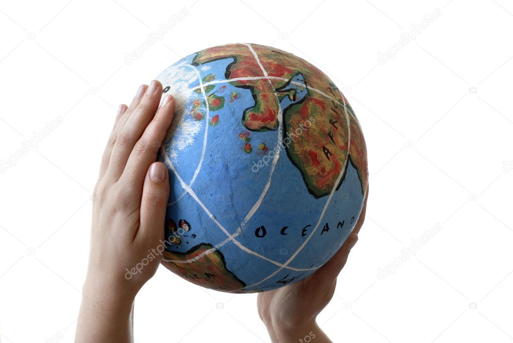 globe in a human hand isolated on white