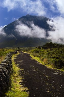 Azores big pico mountain at pico island clipart