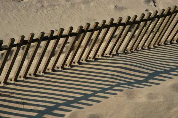 Забор Песке — стоковое фото