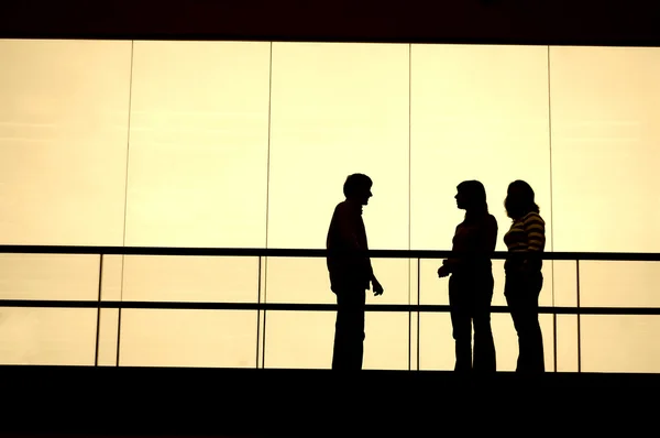 stock image Group talking in the building in sepia tone