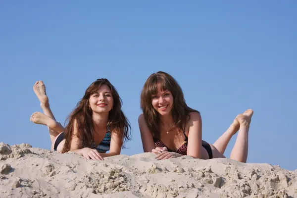 Young girls on a sand-pit — Stock Photo, Image