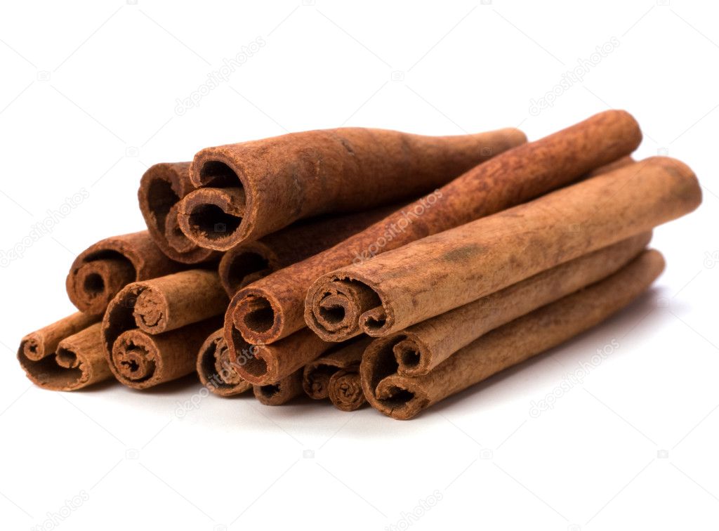 Cinnamon sticks isolated on white background .