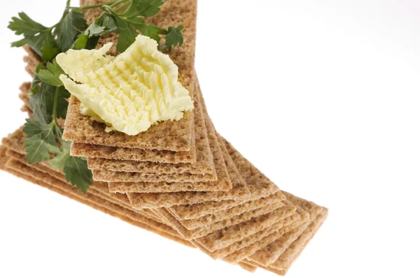 Dieet crackers met peterselie en boter. — Stockfoto