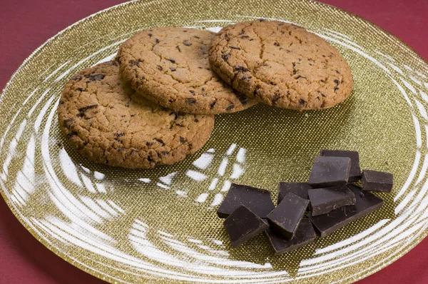 Chocolate and cookies on a plate — Stock Photo, Image