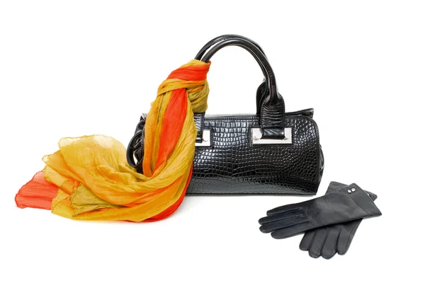 stock image Black bag, scarf and gloves isolated on white