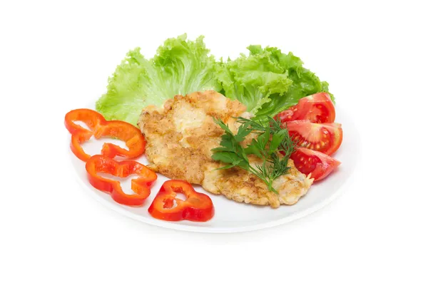 Chicken chop in light batter with vegetables isolated on white — Stock Photo, Image
