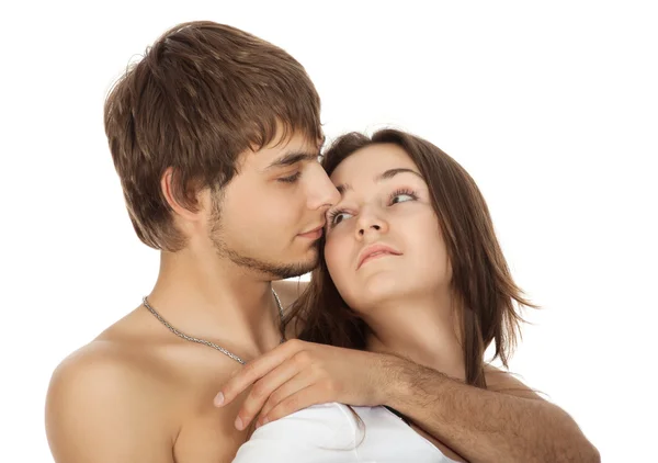 Lyckliga unga par i kärlek isolerad på vit — Stockfoto