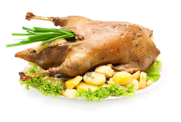 Christmas dinner goose baked with vegetables — Stock Photo, Image