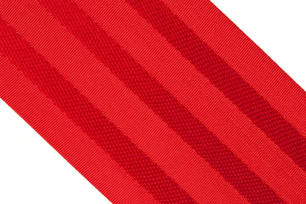 Fita vermelha em um ângulo, isoladamente — Fotografia de Stock