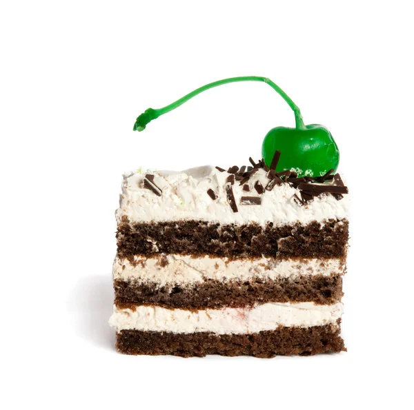 Chocolade cake, versierd met mint groene marsepein kersen — Stockfoto