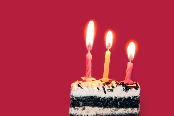 Üzerinde kırmızı parlak doğum günü mumları — Stockfoto