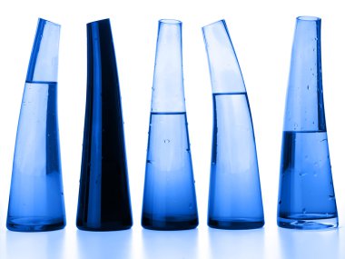 Laboratory flasks with liquid in blue (clipping path) clipart