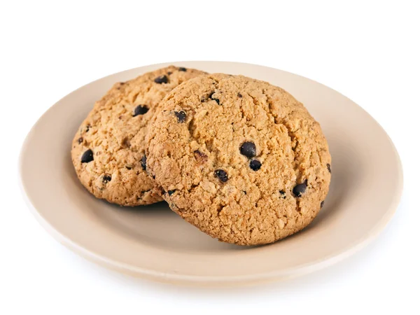 Drei Süße Kekse Auf Dem Teller Vor Weißem Hintergrund — Stockfoto