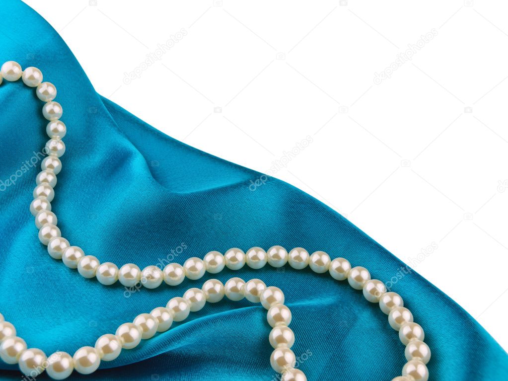 Pearl beads on the blue silk cloth