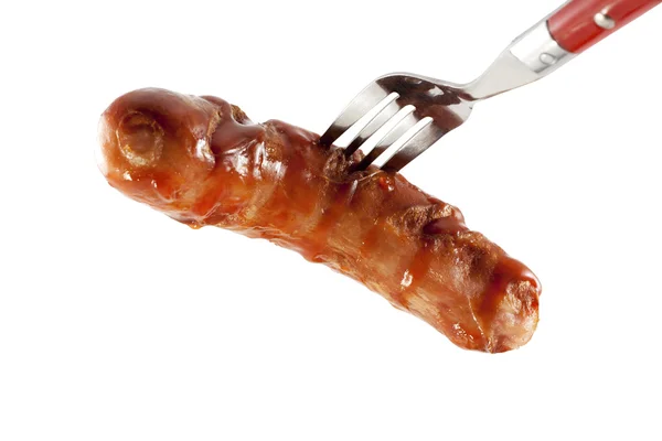 Salsicha frita em um garfo — Fotografia de Stock