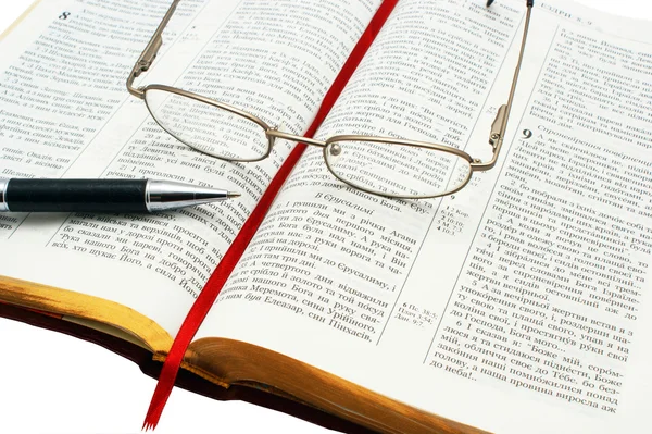 Book, eyeglass, pen — Stock Photo, Image